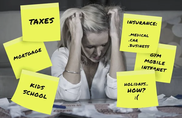 desperate and frustrated blond caucasian family woman domestic accounting worried about money paying taxes calculating expenses and payments suffering stress and financial problem