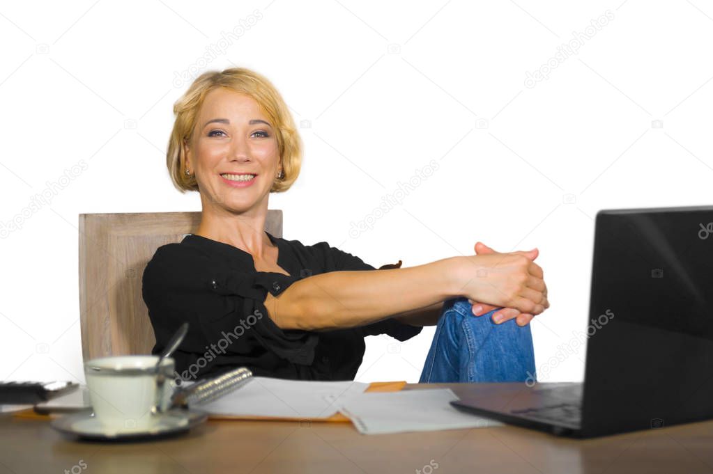 office corporate portrait of young beautiful and happy business woman working relaxed at laptop computer desk smiling confident in job success isolated on white background