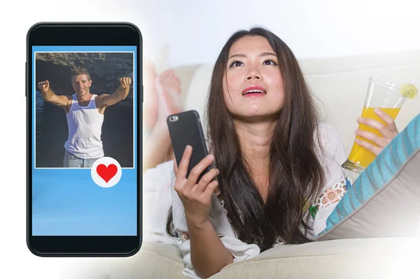 Young Beautiful Happy Asian Girl Using Internet Online Dating App — стоковое фото