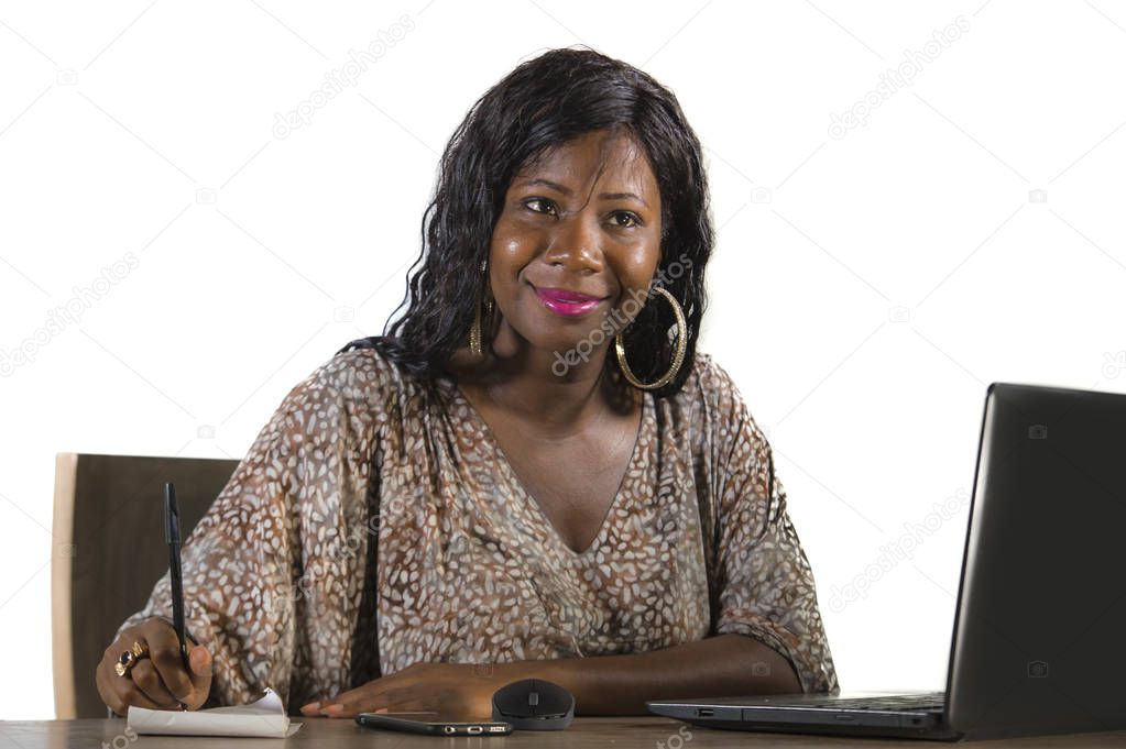 portrait of young beautiful and happy black afro American business woman working cheerful at office laptop computer desk isolated on white background in corporate company job success concept