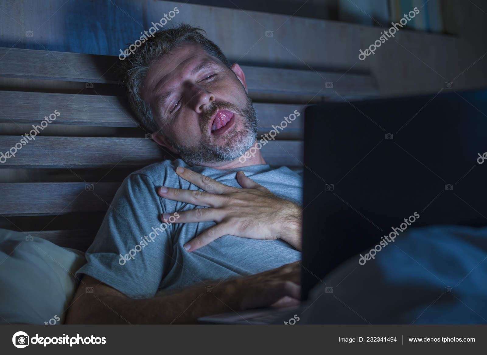 Young Aroused Man Alone Bed Playing Cybersex Using Laptop Computer Stock  Photo by ©TheVisualsYouNeed 232341494