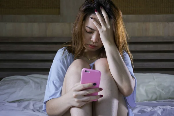 Young Depressed Asian Chinese Girl Using Mobile Phone Crying Bed — Stock Photo, Image