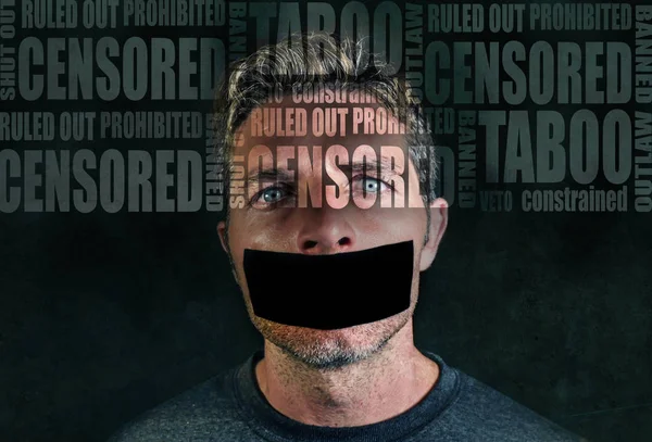 freedom advertising composite with words like censored and taboo composed into face of young sad  man with mouth sticky duct tape shut up isolated on grunge black background