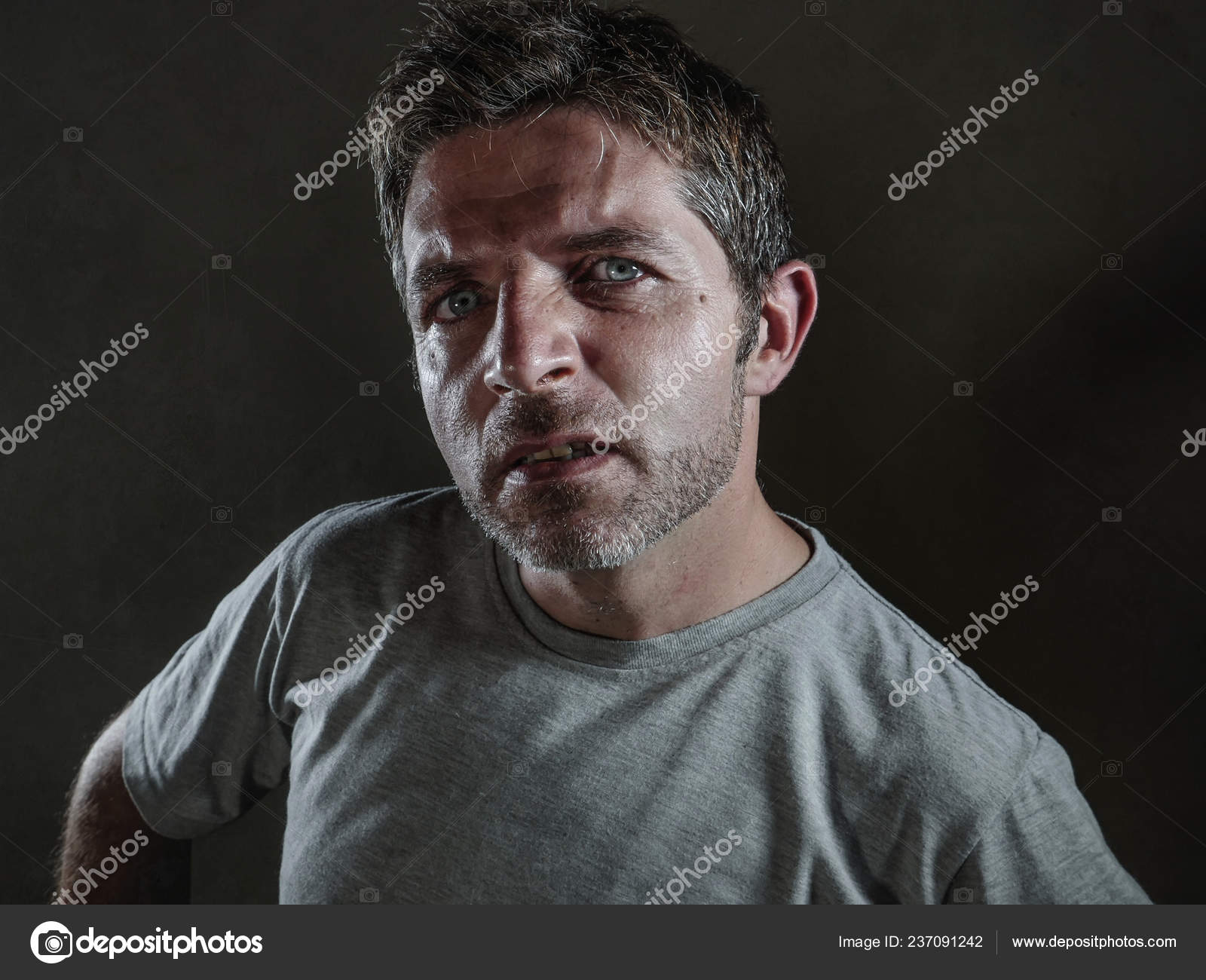 Isolated Dark Background Portrait Young Upset Defiant Man Arrogant Cocky  Stock Photo by ©TheVisualsYouNeed 237091242
