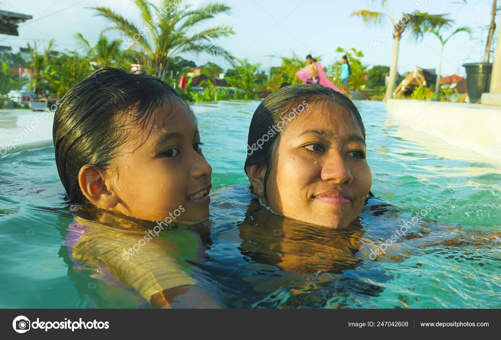 candid swimming Lifestyle Candid Portrait Woman Young Daughter Years Old Girl Having —  Stock Photo © TheVisualsYouNeed #247042608