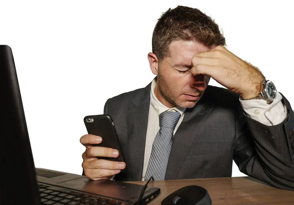 Young frustrated and stressed businessman in suit and tie working overwhelmed at office laptop computer desk desperate and worried cause of work stress — 스톡 사진