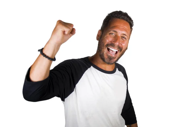 Retrato de jovem feliz e animado homem bem sucedido sentindo animado celebrando sucesso e vitória sorrindo alegre isolado no fundo branco no gesto de punho vencedor — Fotografia de Stock