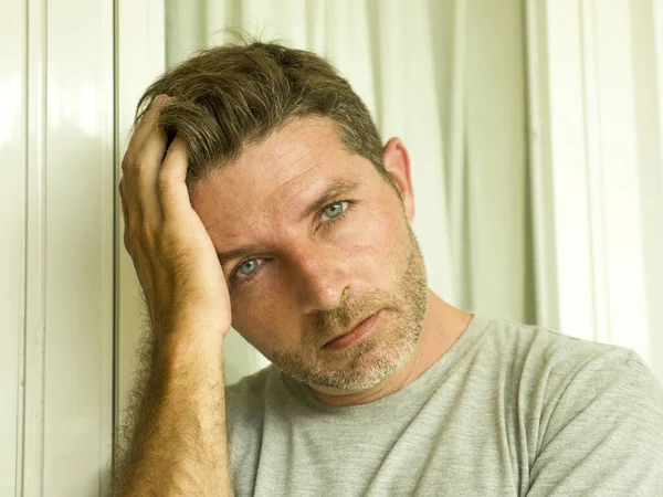 Dramatic portrait of sad and depressed 30s or 40s man in pain feeling stressed and broken suffering depression problem and anxiety crisis looking desperate crying lonely — Stock Photo, Image