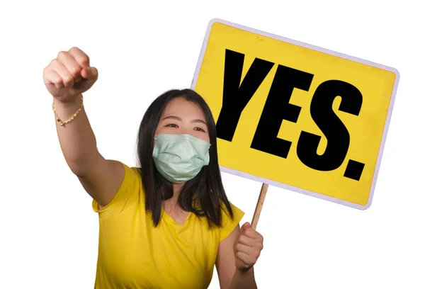 Beautiful and angry Asian woman holding protest billboard with the word Yes protesting in human rights and freedom defense and against abuse  as political activist isolated — Stock Photo, Image