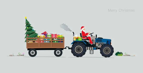 Noel Baba hediye kutuları ve Noel ağaçları ile traktör sürüş.