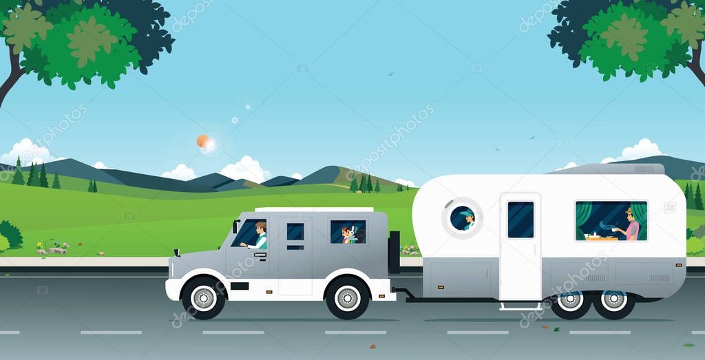 Family caravan traveling With mountains as a backdrop