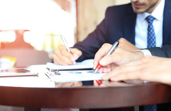 Two Young Businessmen Analyzing Financial Document Meeting — Stock Photo, Image