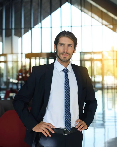 Portrait Happy Young Businessman Standing Hotel Lobby — Stock Photo, Image
