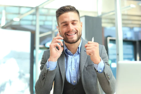 Transparent phones of the future concept, a Caucasian businessman having call with his friend.