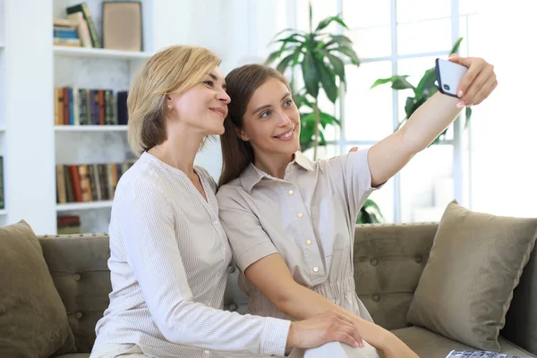 Happy Middle Aged Mother Daughter Taking Selfie Home — Stock Photo, Image