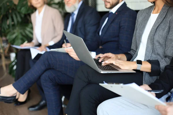 Modern business people waiting for job interview