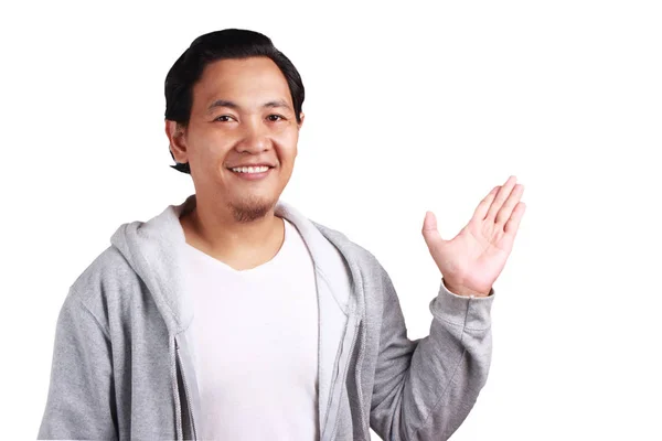 Young Asian Man Wearing White Shirt Gray Jacket Showing Something — Stock Photo, Image