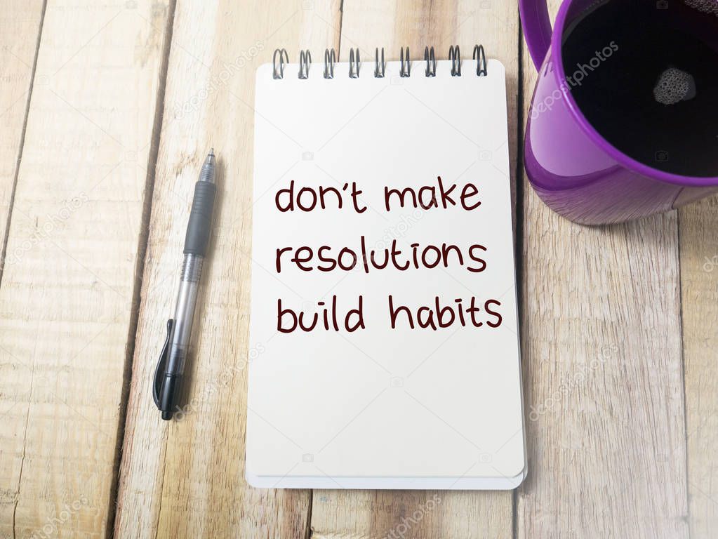 Don't Make Resolutions Build Habits, business motivational inspirational quotes, words typography top view lettering concept