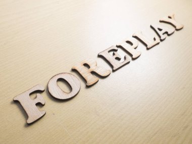 Seks ön sevişme orgazm, yaşam tarzı sağlık ahşap kelime tipografi yazı kavramı