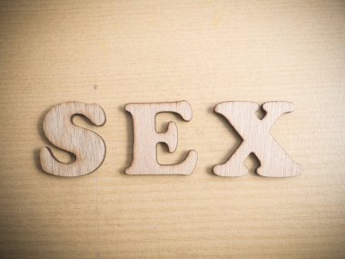 Seks ön sevişme orgazm, yaşam tarzı sağlık ahşap kelime tipografi yazı kavramı