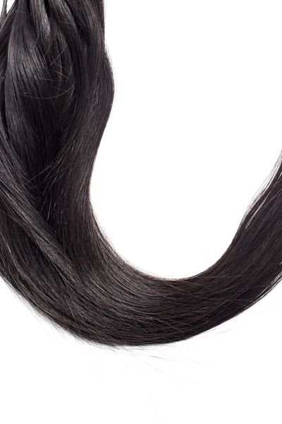 白い背景に分離された曲線の黒い長髪 髪の拡張子をクローズ アップ — ストック写真