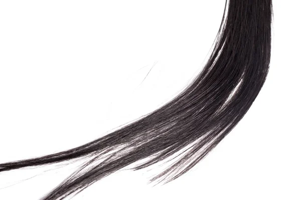 Bochtige Zwarte Lange Haren Geïsoleerd Een Witte Achtergrond Haarverlenging Close — Stockfoto