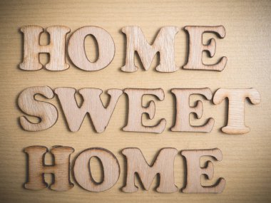 Home Sweet Home Ahşap mektupta, iş tipografi tırnak kavramı 
