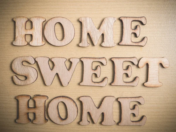 木製の文字 タイポグラフィの引用符のビジネス コンセプトでホーム スイート ホーム — ストック写真