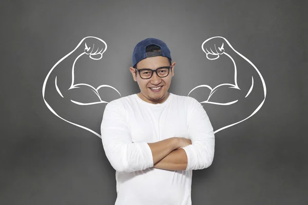 Business power concept. Young  Asian businessman  smiling with strong powerful arms drawn behind. Inner power authority