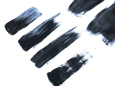 Beyaz arka plan üzerinde soyut sanat kavramı izole siyah akrilik boya kontur