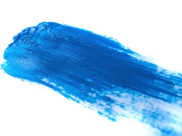 白い背景に 抽象芸術概念に分離された青いアクリル ペイント ストローク — ストック写真