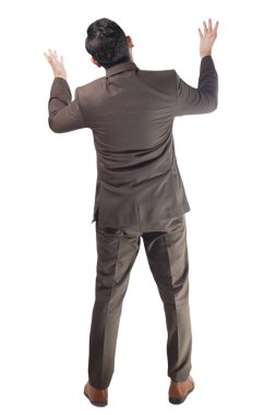 Rear View of of businessman arguing big boss. Man gentleman in formal suit looking up, back side. Full body portrait isolated on white