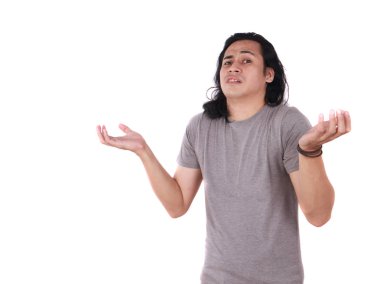 Komik genç omuz silkme omuz, Asya adam mutsuz yüz, gösterilen her ikisi onun avuç içi ile bakan açık, bilmiyorum, Red veya jest inkar gösterilen portresi