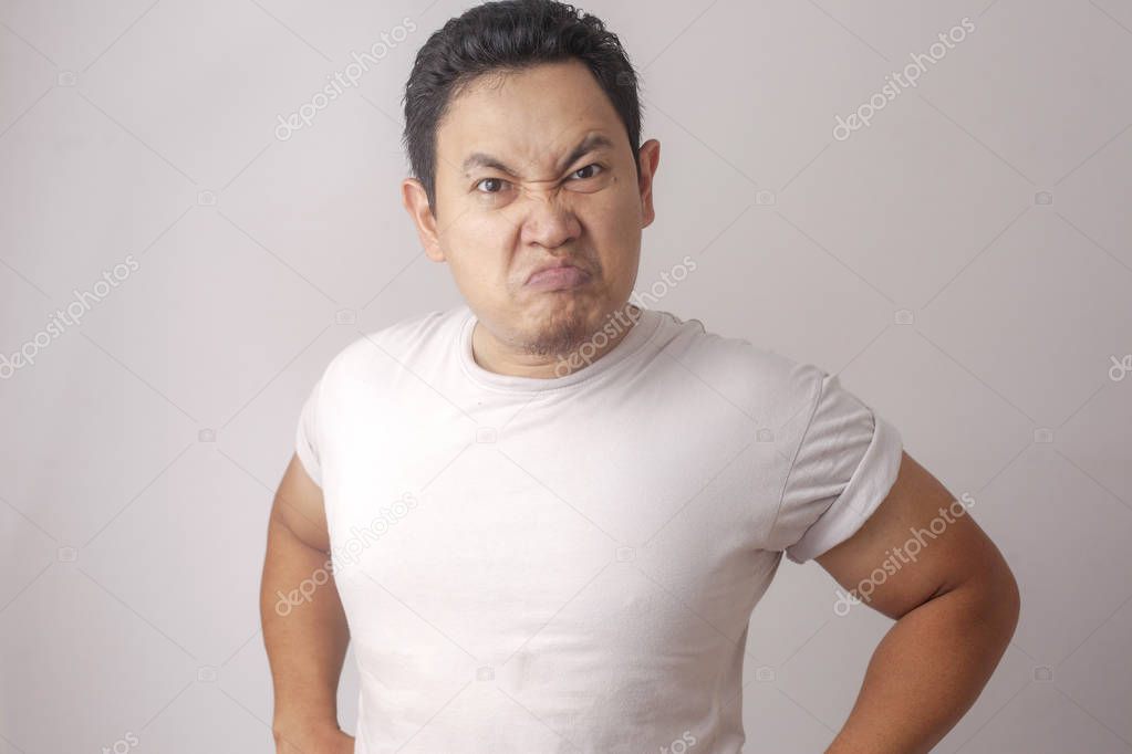 Angry Cynical Asian Man Expression