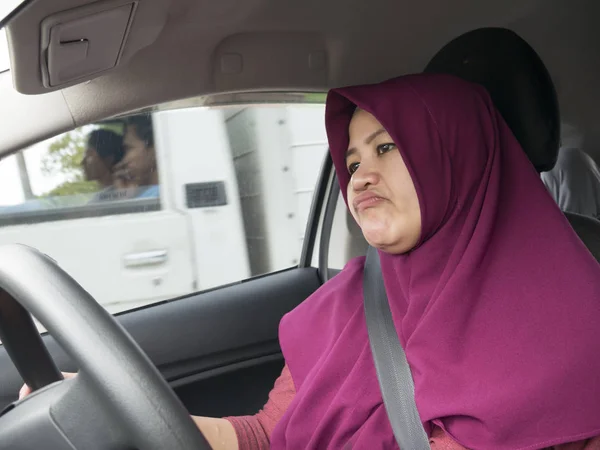 Female Driver Get Bored in Her Car