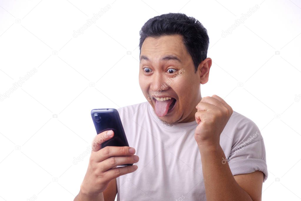 Shocked Happy Man Looking at Smart Phone