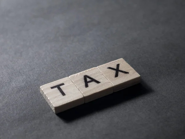 Tax, motiverende zakelijke woorden citaten concept — Stockfoto