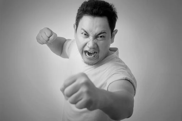 Angry Asian Man Expression Ready to Fight