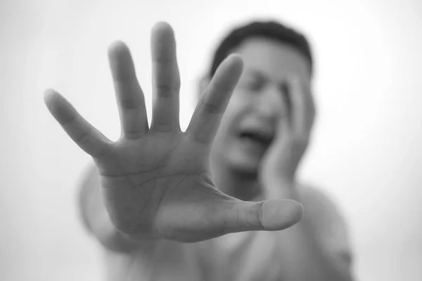 Crying Sad Young Man Showing Surrender Gesture