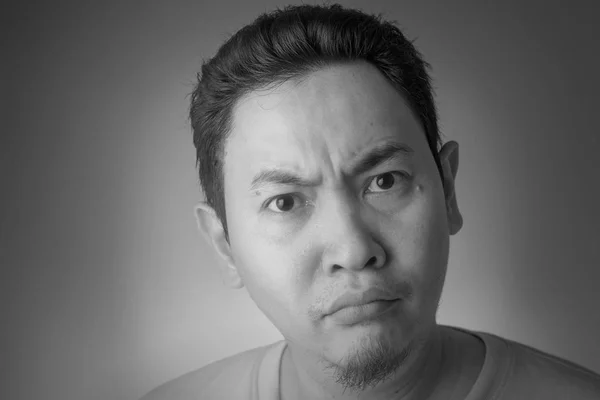 Cynical Asian Man Expression