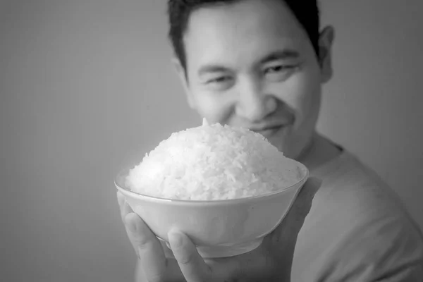 Asiático hombre comer arroz — Foto de Stock