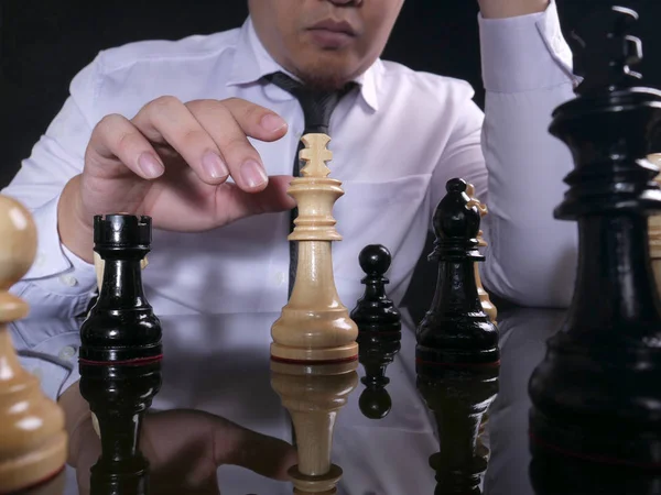 Businessman Playing Chess