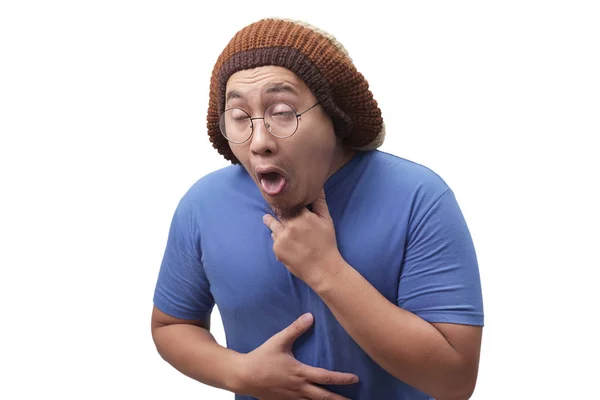 Азиатский человек, выбитый языком — стоковое фото