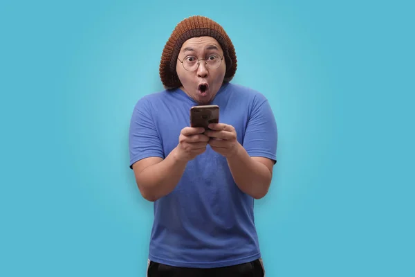 Shocked Happy Man Looking at Smart Phone