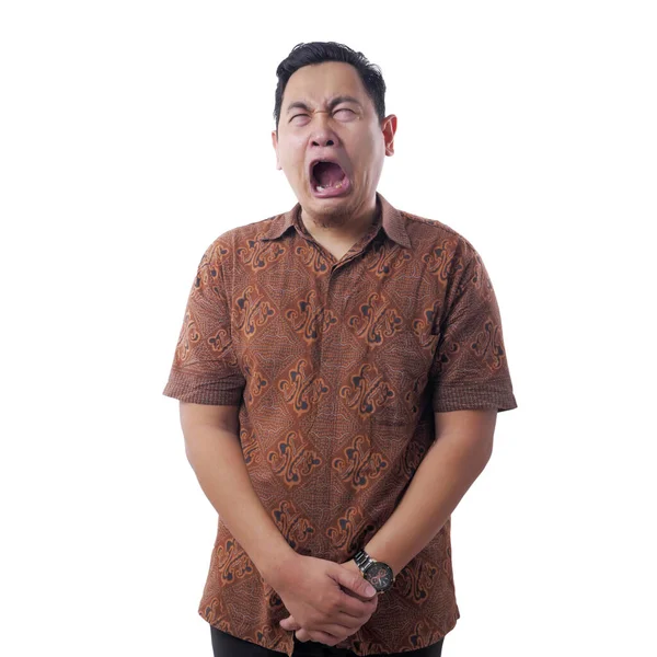 Ásia homem vestindo batik camisa choro Difícil — Fotografia de Stock
