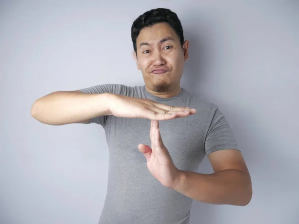 Funny Asian Man Making Time Out Gesture