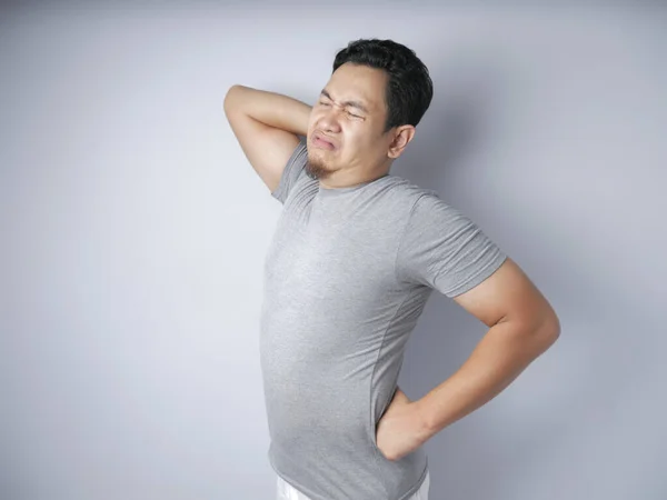 Young Man Suffers From Back Pain — Stock Photo, Image