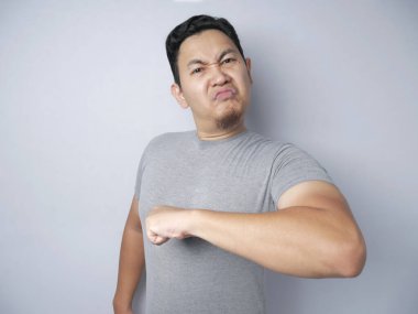 Angry Asian Man Pointing Himself Proudly clipart