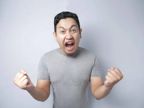 Mladý muž křičí, hněv gesto — Stock fotografie