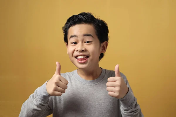 Happy Asian Boy Smiling Camera Showing His Thumb Good Approval — Stock Photo, Image